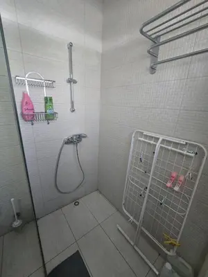 a bathroom with a shower stall with a shower at Lazuli Seafront Beach House Nr18 in Larnaka