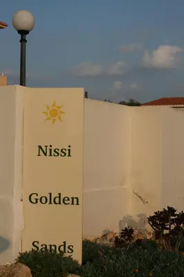 a sign for a nissin global sanders sign at Nissi Villa in Ayia Napa