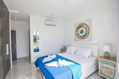 a bedroom with a bed with towels on it at Olivine Pearl OL21 in Protaras