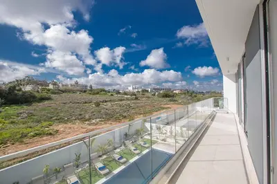 a balcony with a view of the beach at Olivine Pearl OL21 in Protaras
