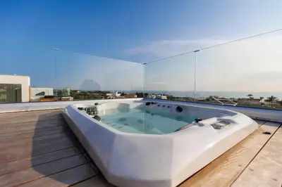 a bath tub on the roof of a building at Napa Hills Seaview Villas - Iris in Ayia Napa