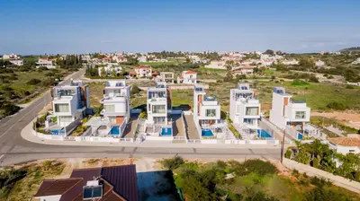 an aerial view of a village with houses at Napa Hills Seaview Villas - Iris in Ayia Napa