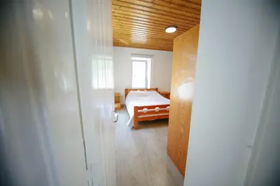 a bedroom with a bed and a window at Legacy 1930s in Prodromos