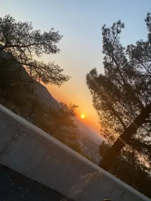 a view of the sunset from a balcony at Legacy 1930s in Prodromos