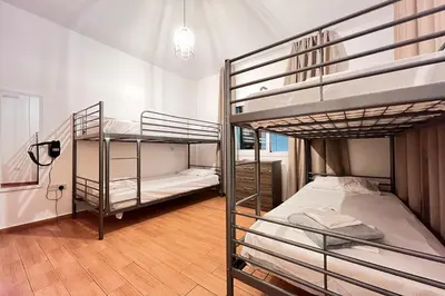 a room with two bunk beds in a building at Villa White Star - 100m from Serena Beach in Protaras