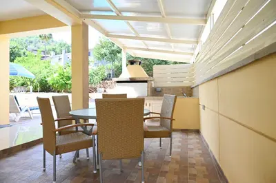 a dining room with a table and chairs at Kakopetria's Holiday House in Kakopetria