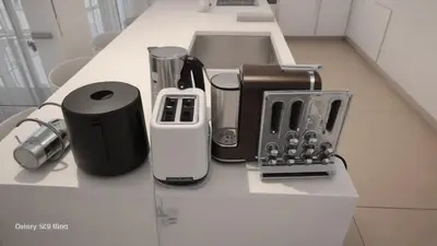 a counter top with various appliances on it at Seaview Luxury Villa Fortuna in Ayia Napa