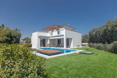 a villa with a swimming pool in a yard at Ayia Napa Holiday Villa Svd2 in Ayia Napa
