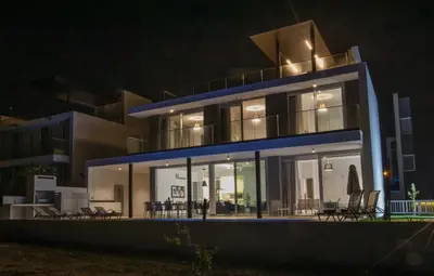 a house at night with the lights on at Protaras Olivine Villa Ol5 in Protaras