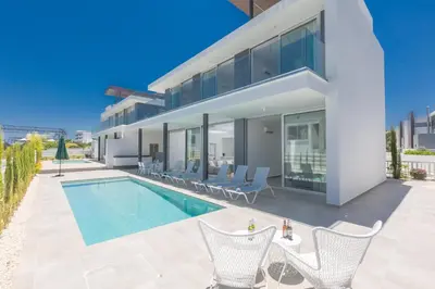 an image of a house with a swimming pool at Protaras Olivine Villa Ol9 in Protaras