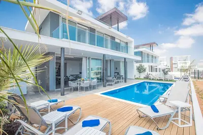 an image of a house with a swimming pool at Villa Olivine Pearl 6 in Protaras