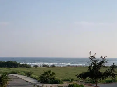 a view of the ocean from the beach at Moonlight Sea View Villa in Ayia Napa
