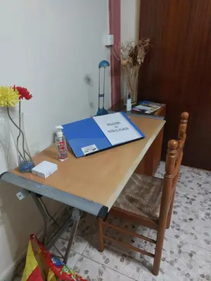 a desk with a blue box on top of it at Kyri's Place Larnaca in Larnaka
