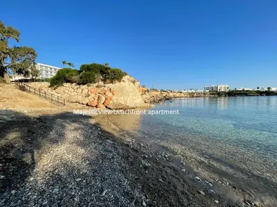 a view of the shore of a body of water at MagesticView seafront apartment in Protaras