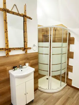 a bathroom with a glass shower and a sink at Amazing Cyprus Glamping Domes - Glamping Cyprus in Paphos City