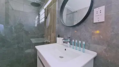 a bathroom with a sink and a mirror at Nissi avenue 64 Studio 2 - Luxcyservices in Ayia Napa