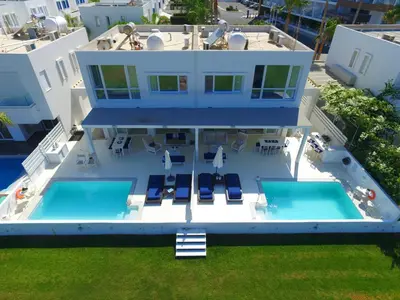 an aerial view of a house with a swimming pool at Narcissus 19 in Paralimni