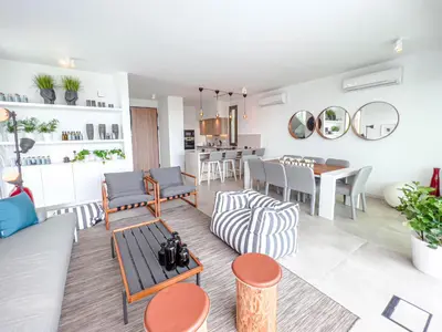 a living room with a couch and chairs and a table at Azure Seaview - Jade Villa in Protaras