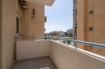 a balcony with a view of a city at Andrea 3-Bedroom Apt in Mackenzie in Larnaka