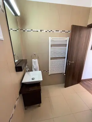 a bathroom with a sink and a mirror at Villa Flory in Protaras